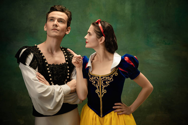 Young ballet dancers as a Snow Whites characters in forest modern tales - Foto, afbeelding