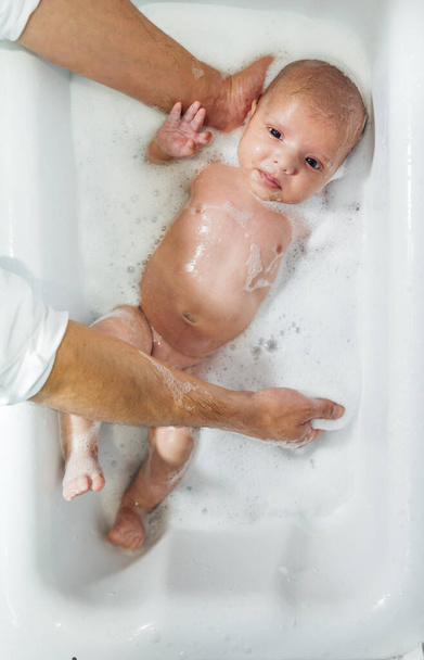 Baby boy in the bath tub - Photo, Image