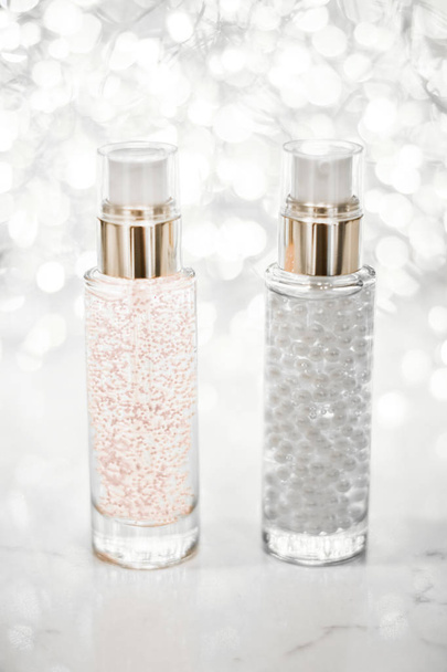 Holiday make-up base gel, γαλάκτωμα ορού, μπουκάλι λοσιόν και silv - Φωτογραφία, εικόνα