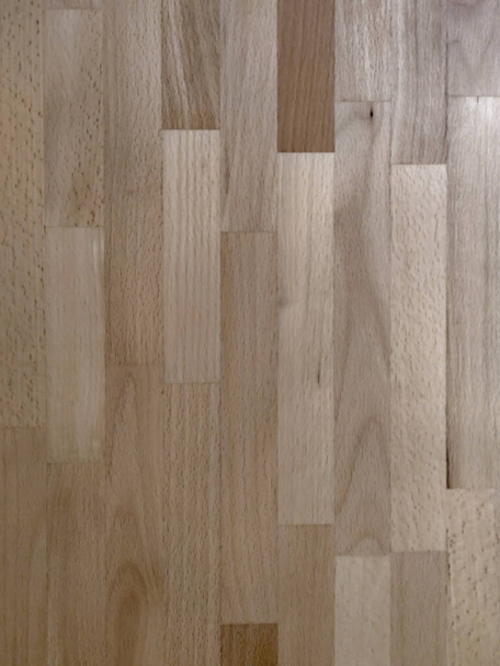 Коричневые деревянные обои фоновый ламинат как блок, который можно найти на столе, на полу, дверях или стене
. - Фото, изображение