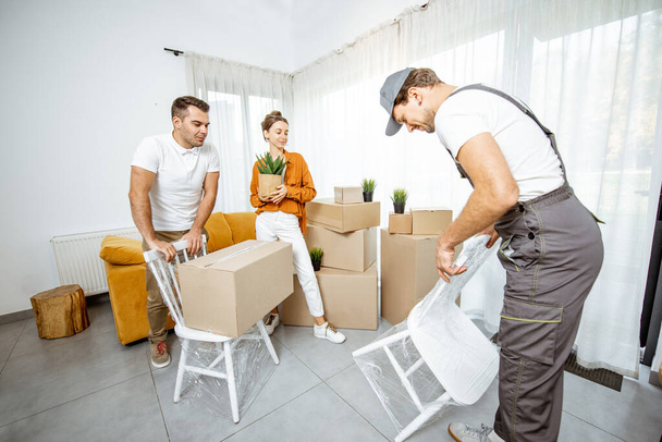 Young couple moving into a new house - Photo, Image