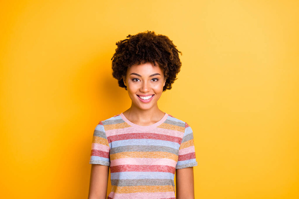 Photo of cute nice pretty sweet girlfriend looking like teenager smiling before camera isolated vibrant color yellow background - Foto, immagini