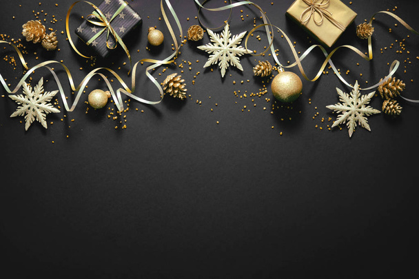 Christmas golden decoration on dark background - Foto, immagini