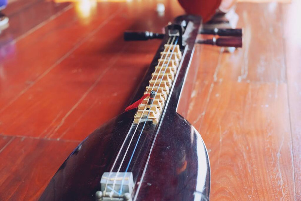 Oude traditionele Thaise houten muziekinstrumenten close-up - Foto, afbeelding