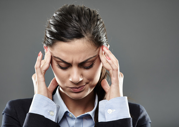 Businesswoman with strong migraine - Photo, image