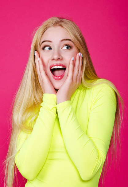 Portrait of fashion surprised blonde model girl young woman wear - Foto, Imagen