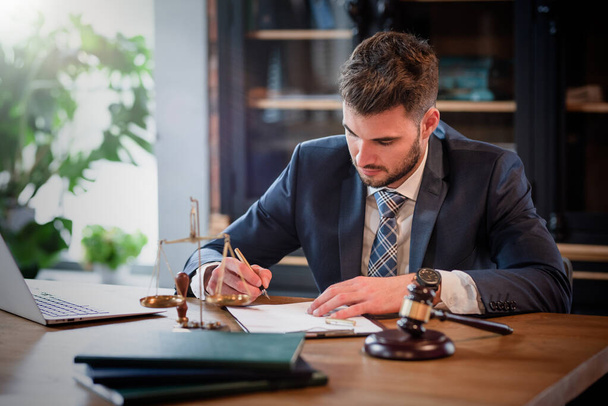 Lawyer or attorney working in the office - Fotó, kép
