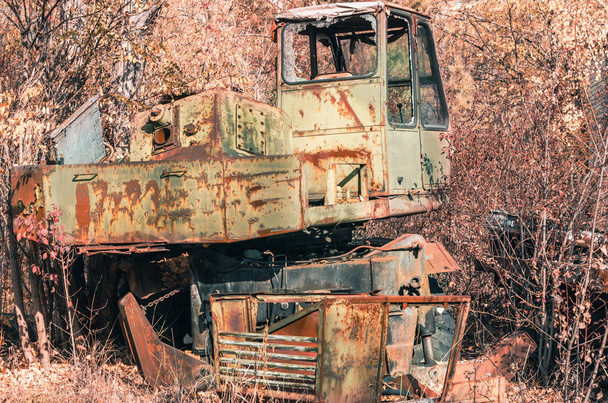 abandoned broken equipment in the Chernobyl forest - 写真・画像