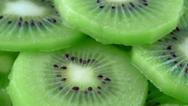 Macro rotatie video schieten van plak kiwi fruit .Close up vlees van kiwi. - Video