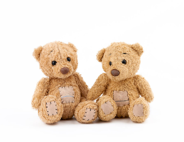 twee brown teddyberen zitten - Foto, afbeelding