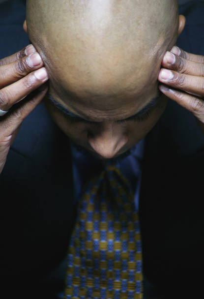 Businessman with headache - Photo, image