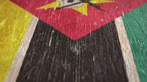 Flag Of Mozambique. Detail On Wood, Shallow Depth Of Field, Seamless Loop. High-Quality Animation. Ideal For Your Country / Travel / Political Related Projects. 1080p, 60fps. - Footage, Video