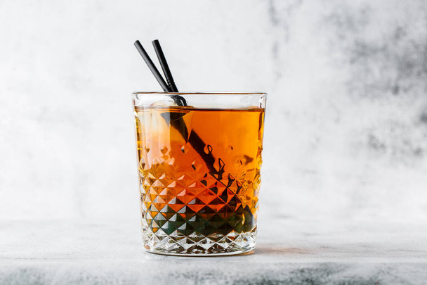 Glasse of iced black tea with lemon, overhead view. isolated on bright marble background. Overhead view, copy space. Advertising for cafe menu. Coffee shop menu. Horizontal photo. - Foto, Imagem