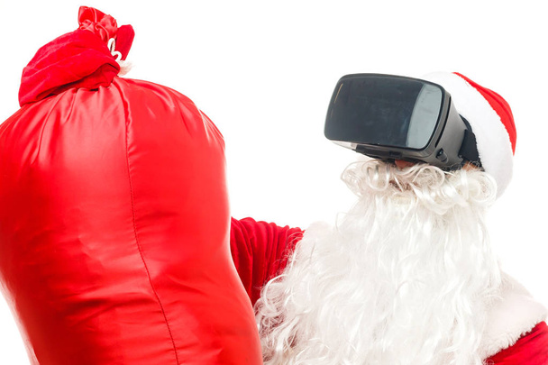 Babbo Natale indossa occhiali di realtà virtuale
  - Foto, immagini