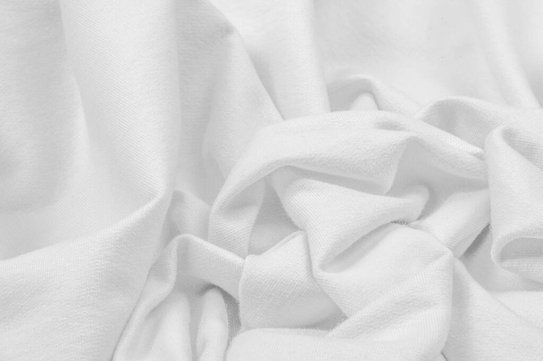 Texture background pattern. The fabric is knitted white. This st - Photo, Image
