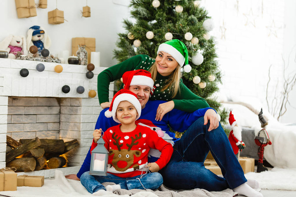 Happy family celebrating Christmas together at home - Photo, Image