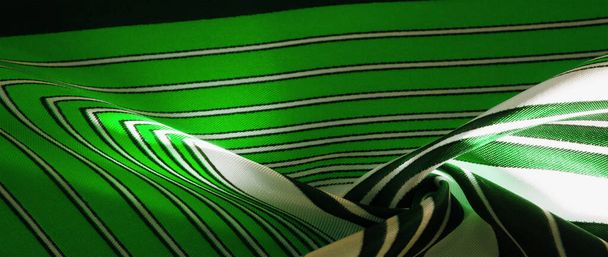 Textura, tela de seda con un patrón de rayas verdes. El diseño o
 - Foto, imagen