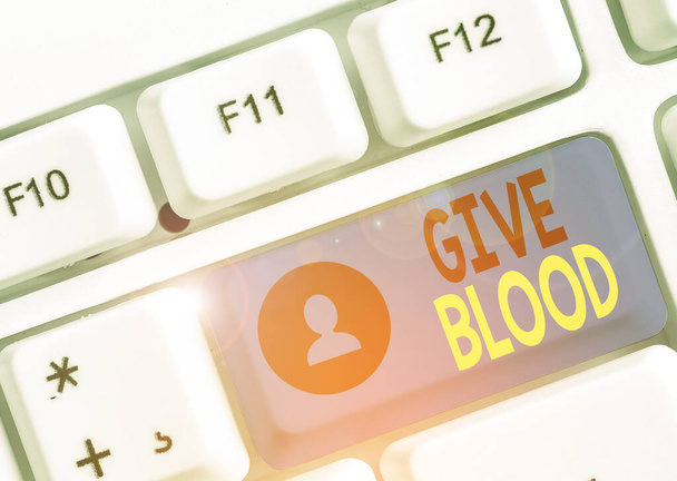 Woord schrijven tekst Geef bloed. Bedrijfsconcept om vrijwillig aan te tonen dat bloed wordt afgenomen en gebruikt voor transfusies. - Foto, afbeelding