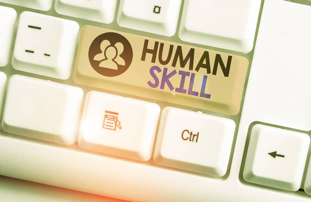 Text sign showing Huanalysis Skill. Conceptual photo involve the ability to work well with other showing individually White pc keyboard with empty note paper above white background key copy space. - Photo, Image