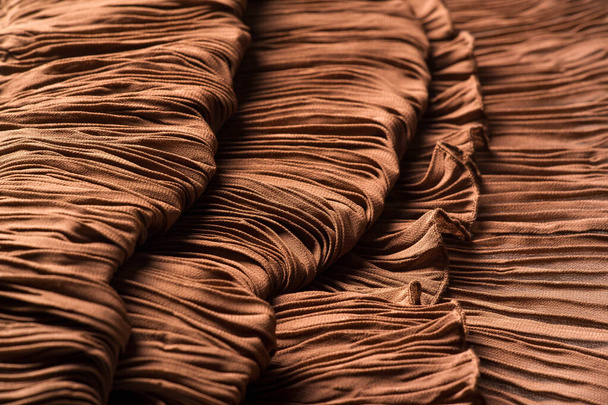 Textura, fondo, patrón, tela gofre marrón. Color albaricoque
. - Foto, Imagen