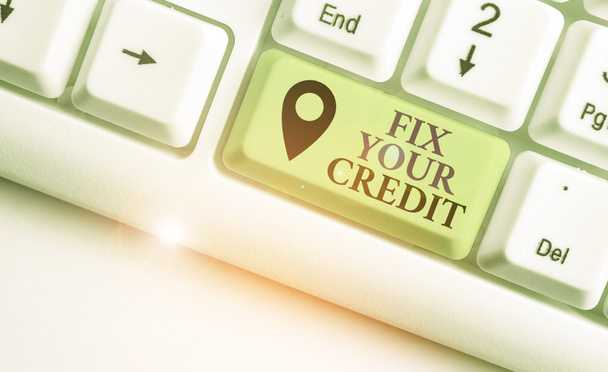 Writing note showing Fix Your Credit. Business photo showcasing Keep balances low on credit cards and other credit. - Photo, Image