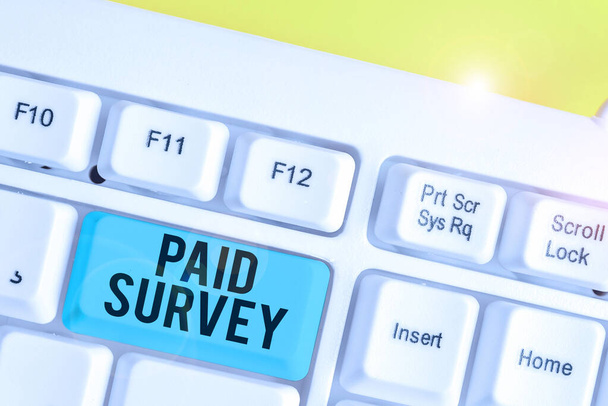 Conceptual hand writing showing Paid Survey. Business photo text statistical survey where the participants are rewarded or paid White pc keyboard with note paper above the white background. - Photo, Image