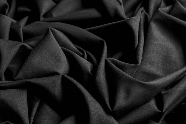 Teksturowane tło plany, czarna tkanina. Ta lekka tkanina li - Zdjęcie, obraz