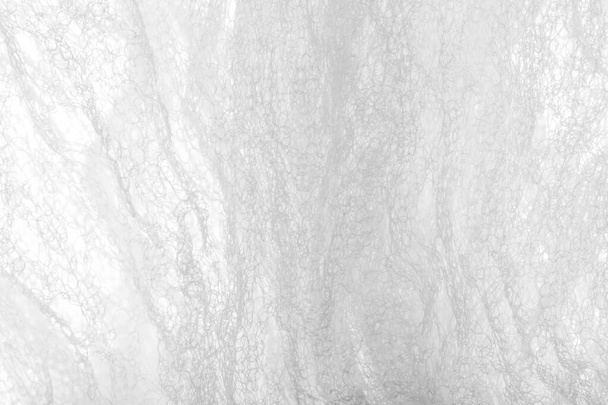 Bir un sayesinde bir örgü doku arka plan deseni beyaz kumaş - Fotoğraf, Görsel