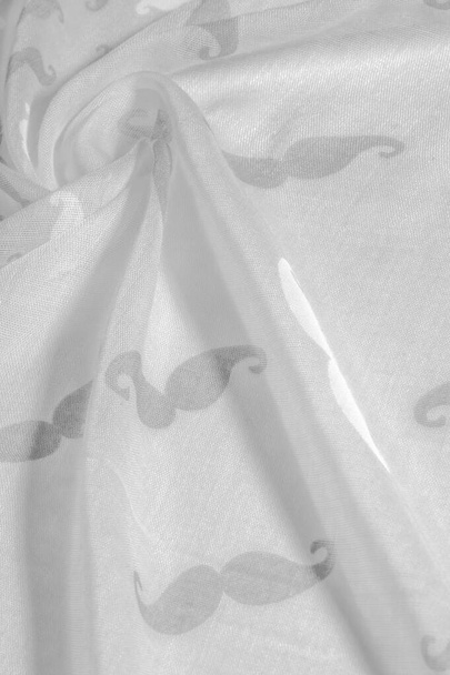 Texture background, white silk fabric with painted cartoon musta - Photo, Image