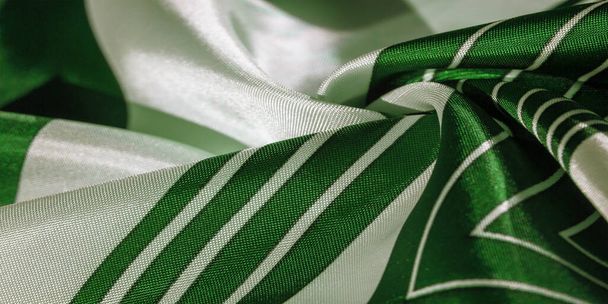 Textura, tela de seda con un patrón de rayas verdes. El diseño o
 - Foto, imagen