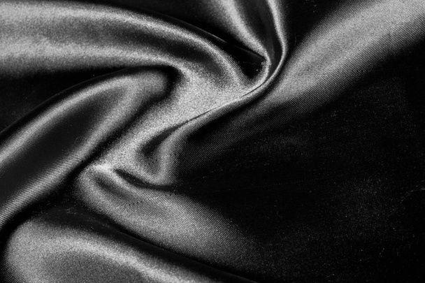 текстура, фон, візерунок. Чорна шовкова тканина. Він чорний і
 - Фото, зображення