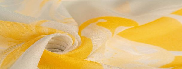 Texture, background, pattern, silk fabric, yellow flowers on a g - Photo, Image