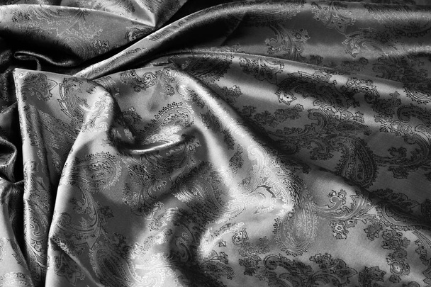 υφή, φόντο, μαύρο ατσάλι γκρίζο ύφασμα με ένα Λαχούρι - Φωτογραφία, εικόνα