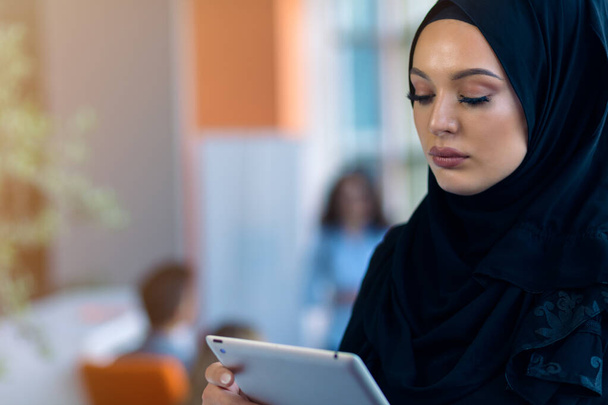 pretty modern Arabian woman with tablet computer - Foto, immagini