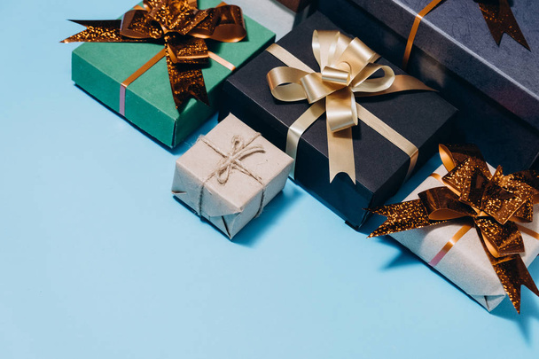 Christmas holiday composition. Various gift boxes on pastel blue background. Christmas, new year, birthday concept. Flat lay, top view, copy space - Fotó, kép