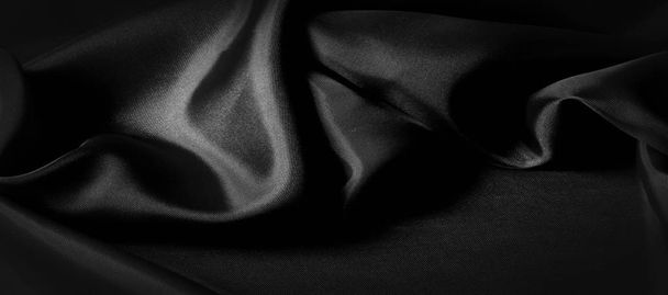 texture, background, pattern. Black silk fabric. It is black and - Photo, Image