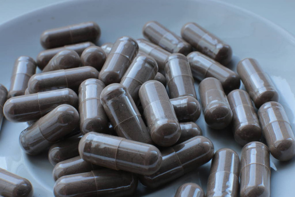 macro achtergrond pillen, medische bio supplementen en vitaminen - Foto, afbeelding