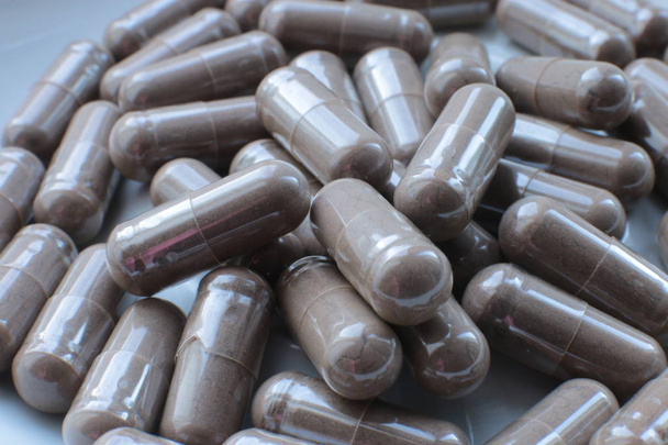 macro píldoras de fondo, suplementos médicos bio y vitaminas
 - Foto, Imagen