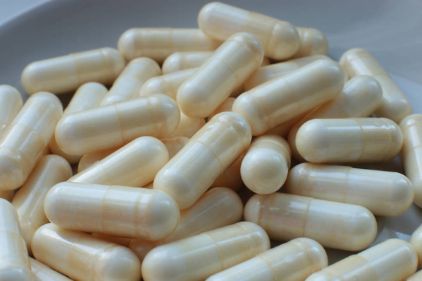 macro achtergrond pillen, medische bio supplementen en vitaminen - Foto, afbeelding