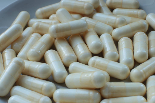 macro pillole di sfondo, integratori biologici medici e vitamine
 - Foto, immagini