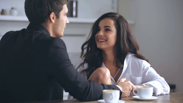 back view of businessman talking with girlfriend  - Video, Çekim