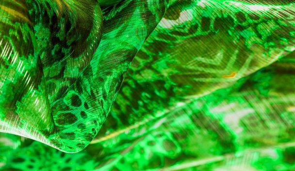 Background texture, pattern. Silk from a greenish emerald shade. - Photo, Image
