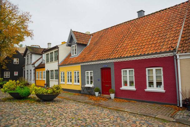 Odense, Denmark: Old homes in cobbled streets in Odense, the city of Hans Christian Andersen - Photo, image