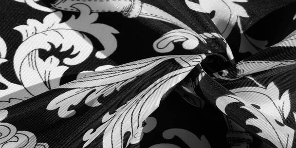 textura, pozadí, černá hedvábná tkanina s monogramovou maskou E - Fotografie, Obrázek