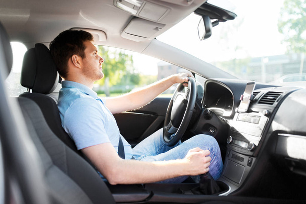 man or driver driving car in summer - Фото, изображение