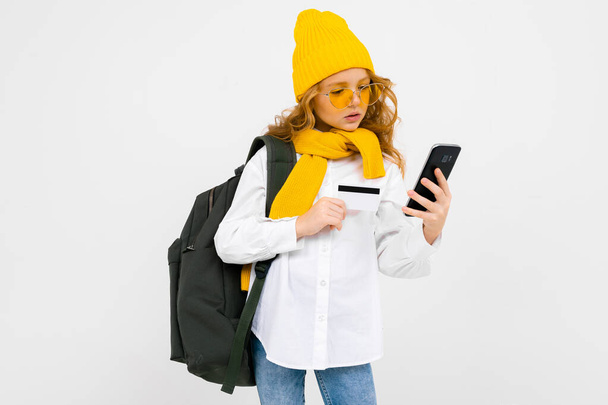 cute fashionable little traveler girl with mobile phone - Foto, imagen