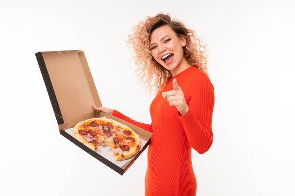 young woman in red dress posing with pizza against white background   - Φωτογραφία, εικόνα