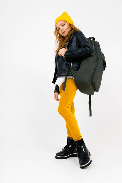 cute fashionable little girl in leather jacket with backpack - Foto, Imagem