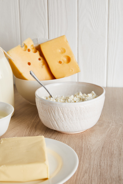 delicious fresh dairy products on white wooden background - Valokuva, kuva