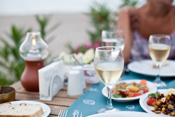 Romantic dinner with white wine. - Photo, Image